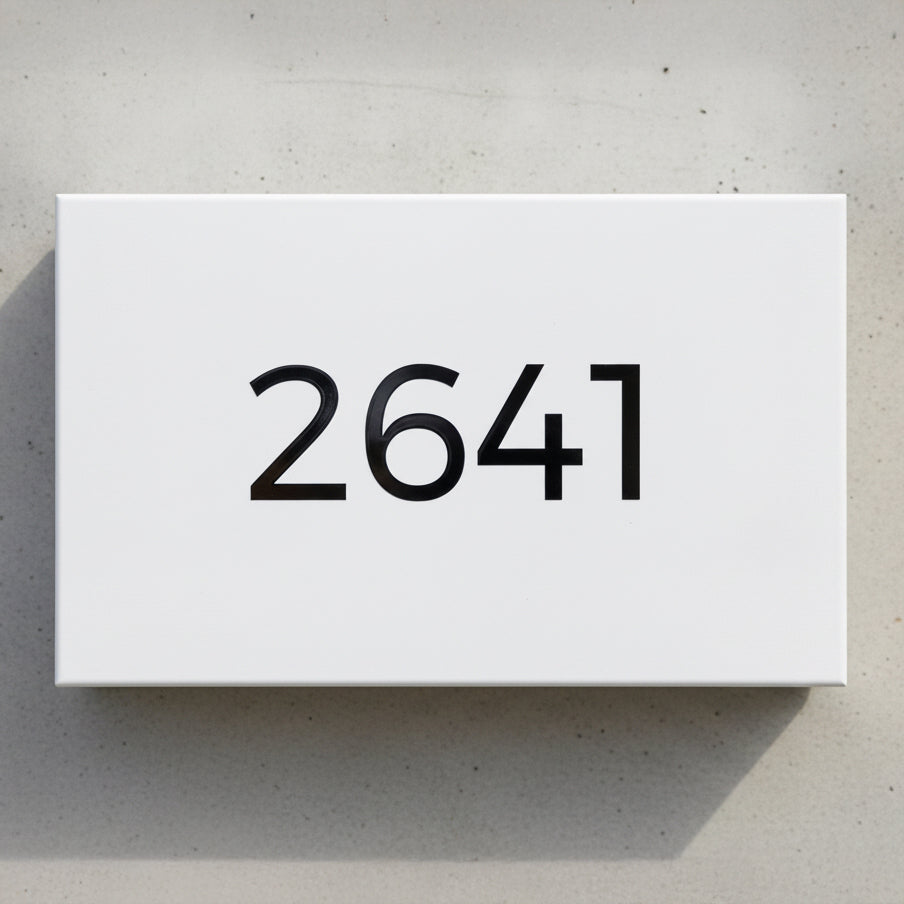 black modern style vinyl stickers on a white mailbox