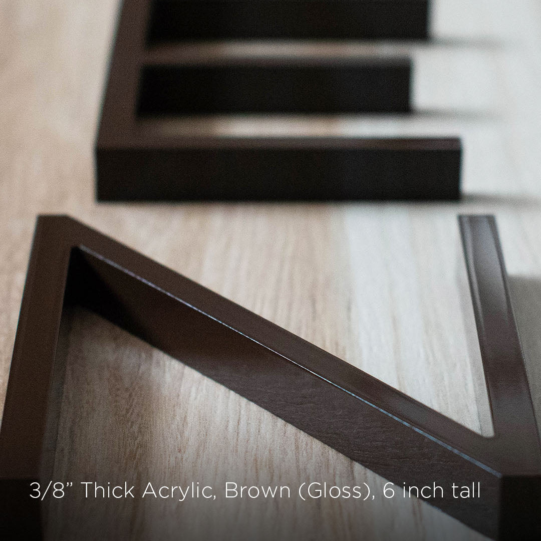 6 inch tall Brown acrylic house numbers on a light wood surface with text overlay.